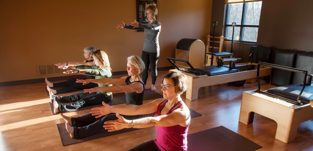 Women doing pilates poses